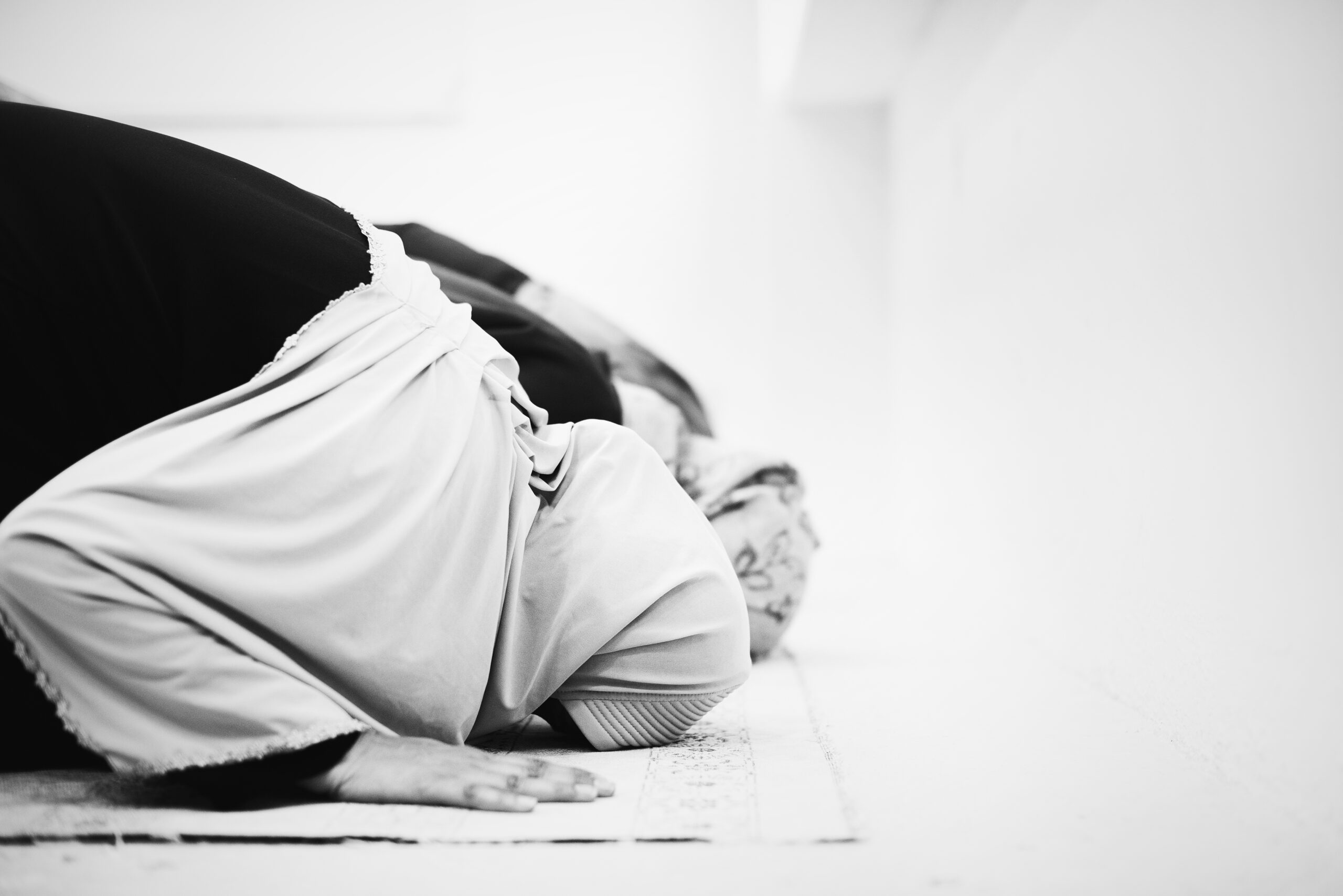 Muslim woman praying at Tasneem Hotel Zanzibar