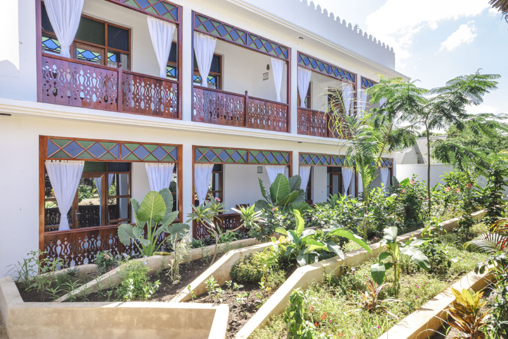 View of multiple rooms with a garden view at Tasneem Hotel, Zanzibar