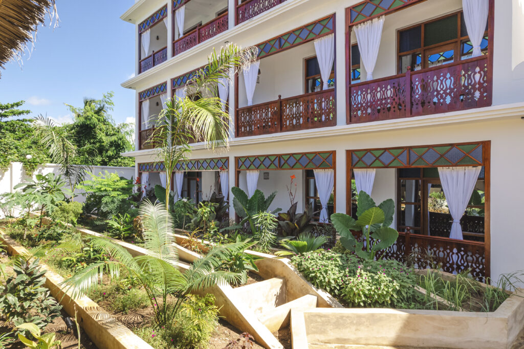 View of multiple rooms with a garden view at Tasneem Hotel, Zanzibar