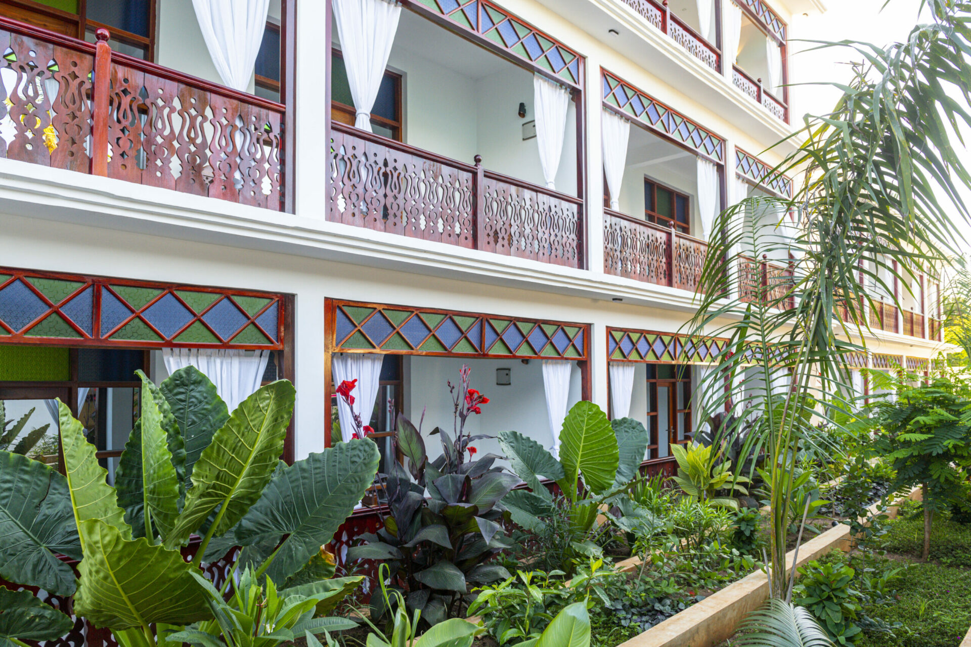 View of multiple rooms with a garden view at Tasneem Hotel, Zanzibar