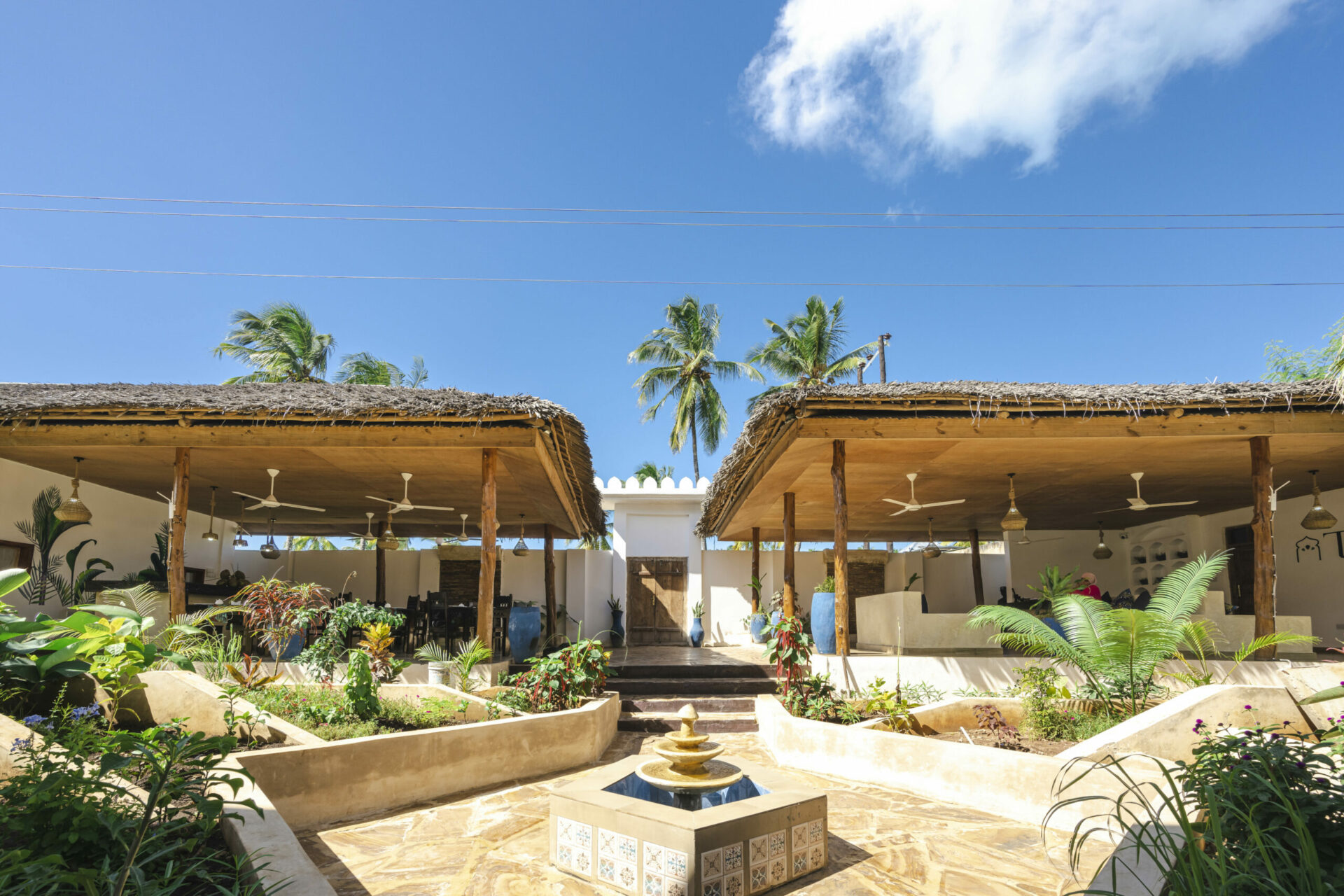 Entrance of Tasneem Hotel in Jambiani, Zanzibar - a warm and welcoming atmosphere