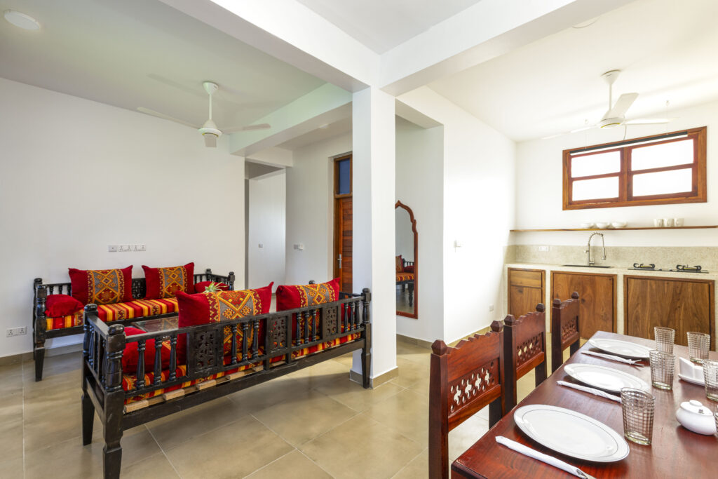 Kitchen with modern dining area at Tasneem Hotel Zanzibar, providing a cozy and functional space for guests